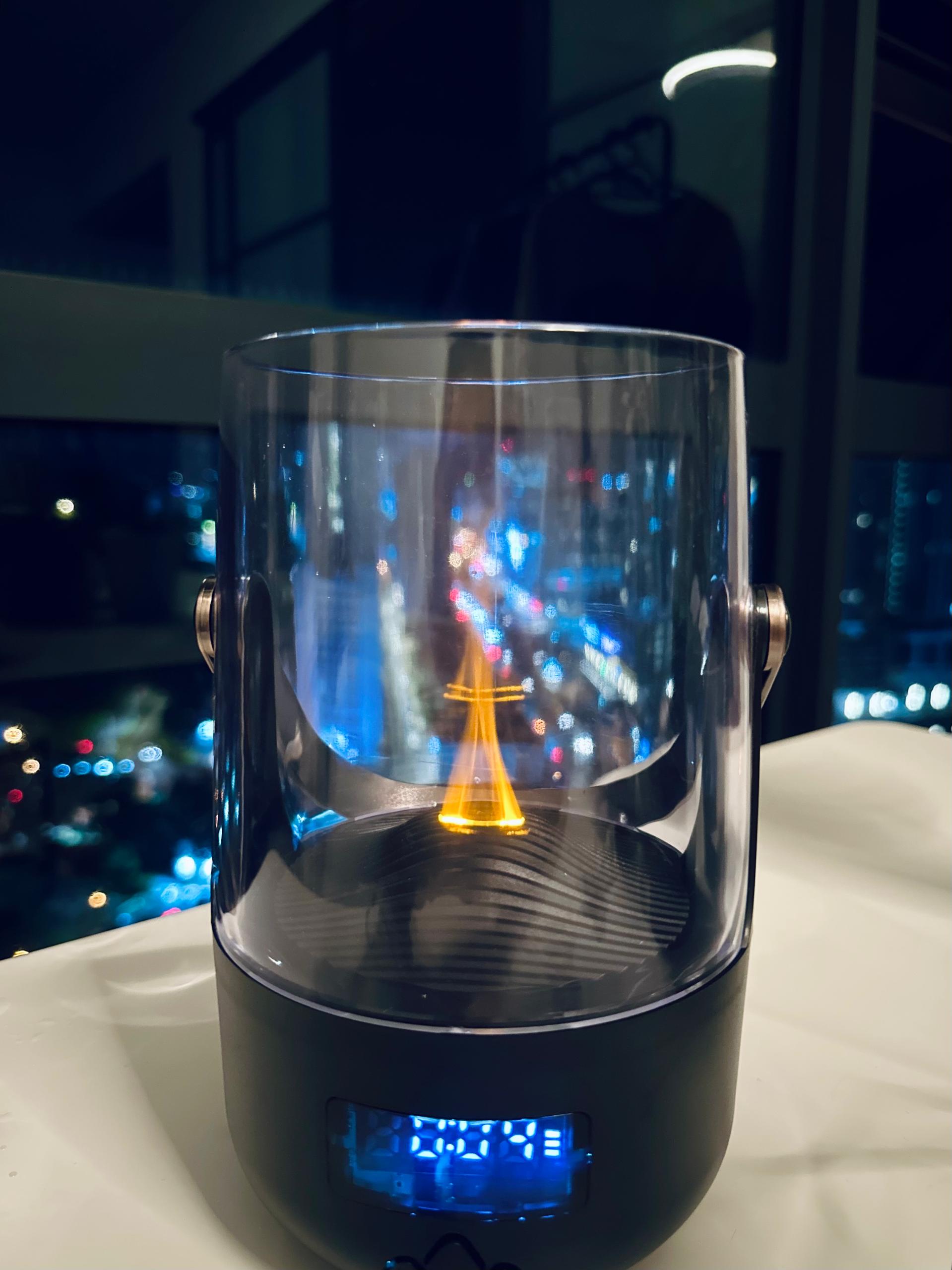 Aroma diffuser with warm flame effect and night city view | Fixxora