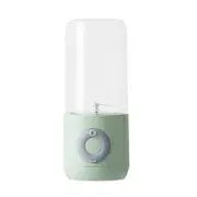Compact green pastel portable blender with detachable cup shown on white background