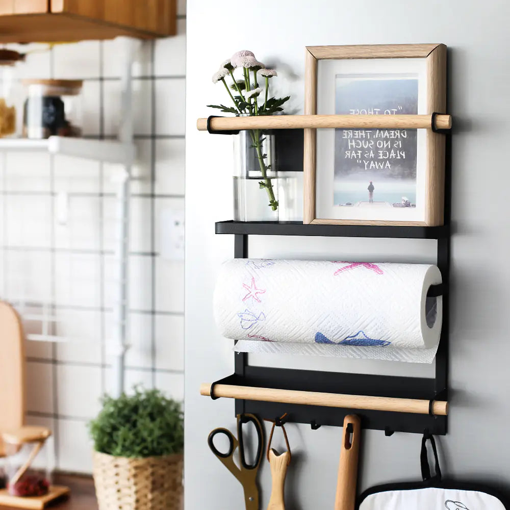 Wall-mounted kitchen rack with spice jars, scissors, and storage accessories in kitchen setting | Fixxora