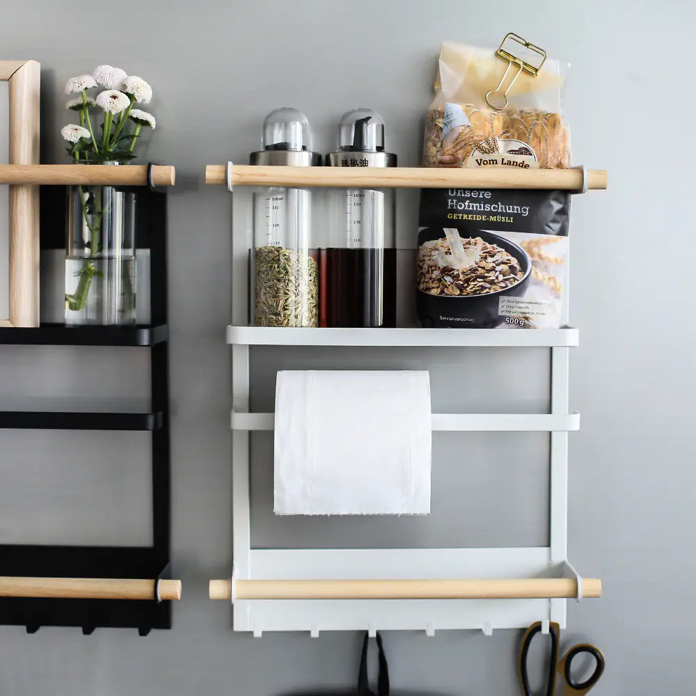 White wall-mounted kitchen storage rack with paper towel holder and multipurpose shelves | Fixxora